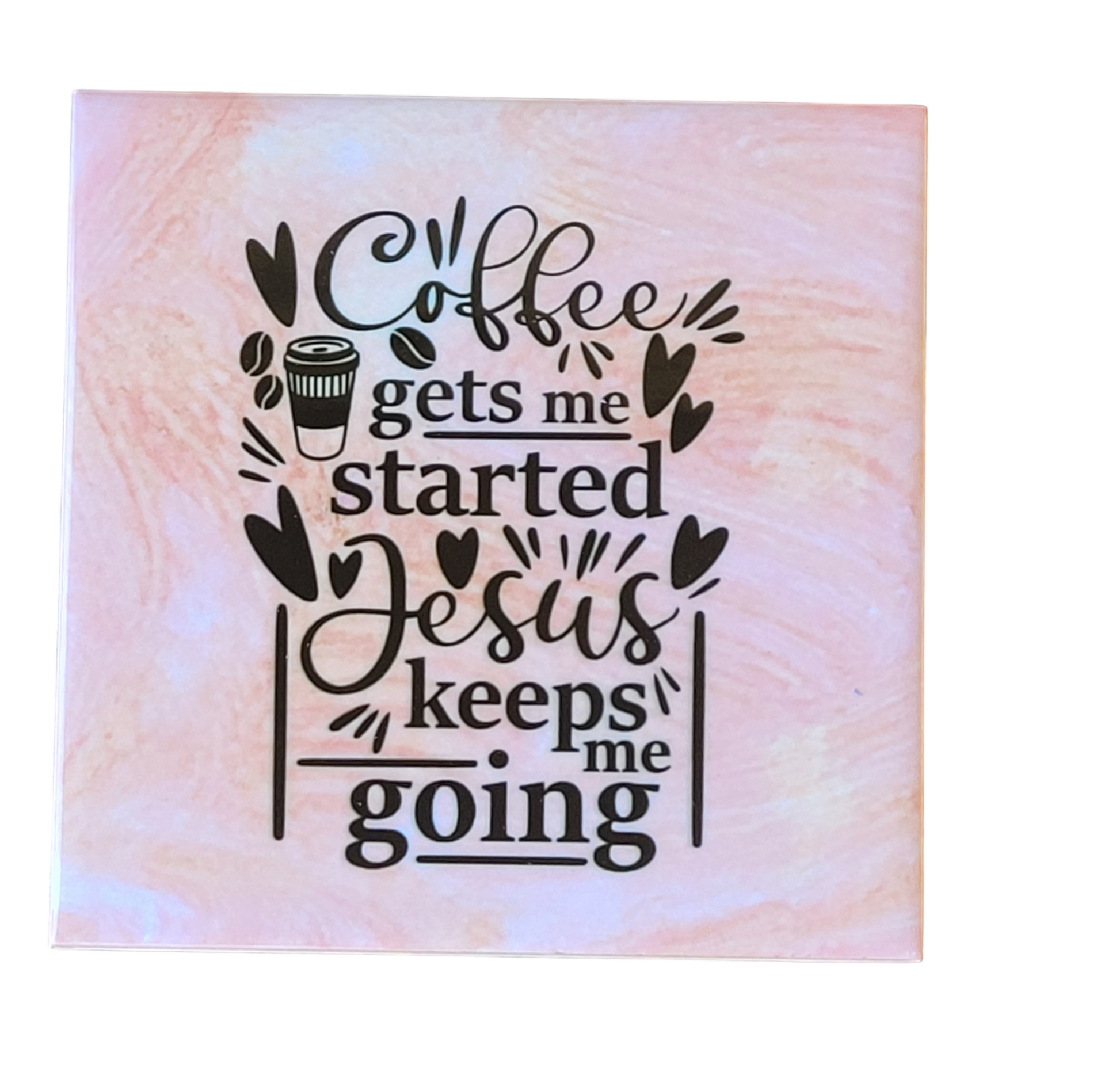 pink alcohol ink background on 4.5 x 4.5-inch ceramic tile with the words "Coffee gets me started Jesus keeps me going"