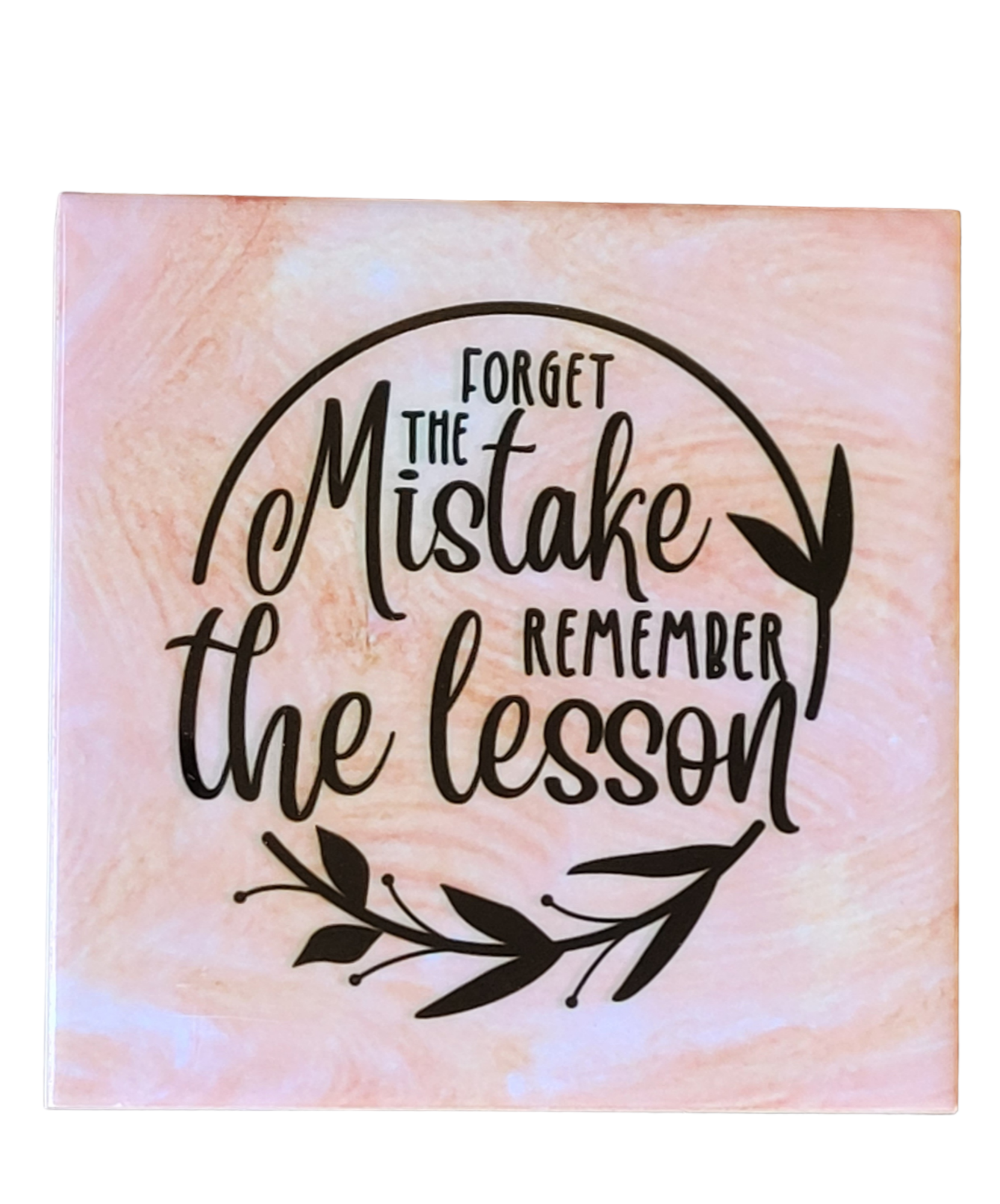 pink alcohol ink background on 4.5 x 4.5-inch ceramic tile with the words "Forget the Mistake Remember the lesson