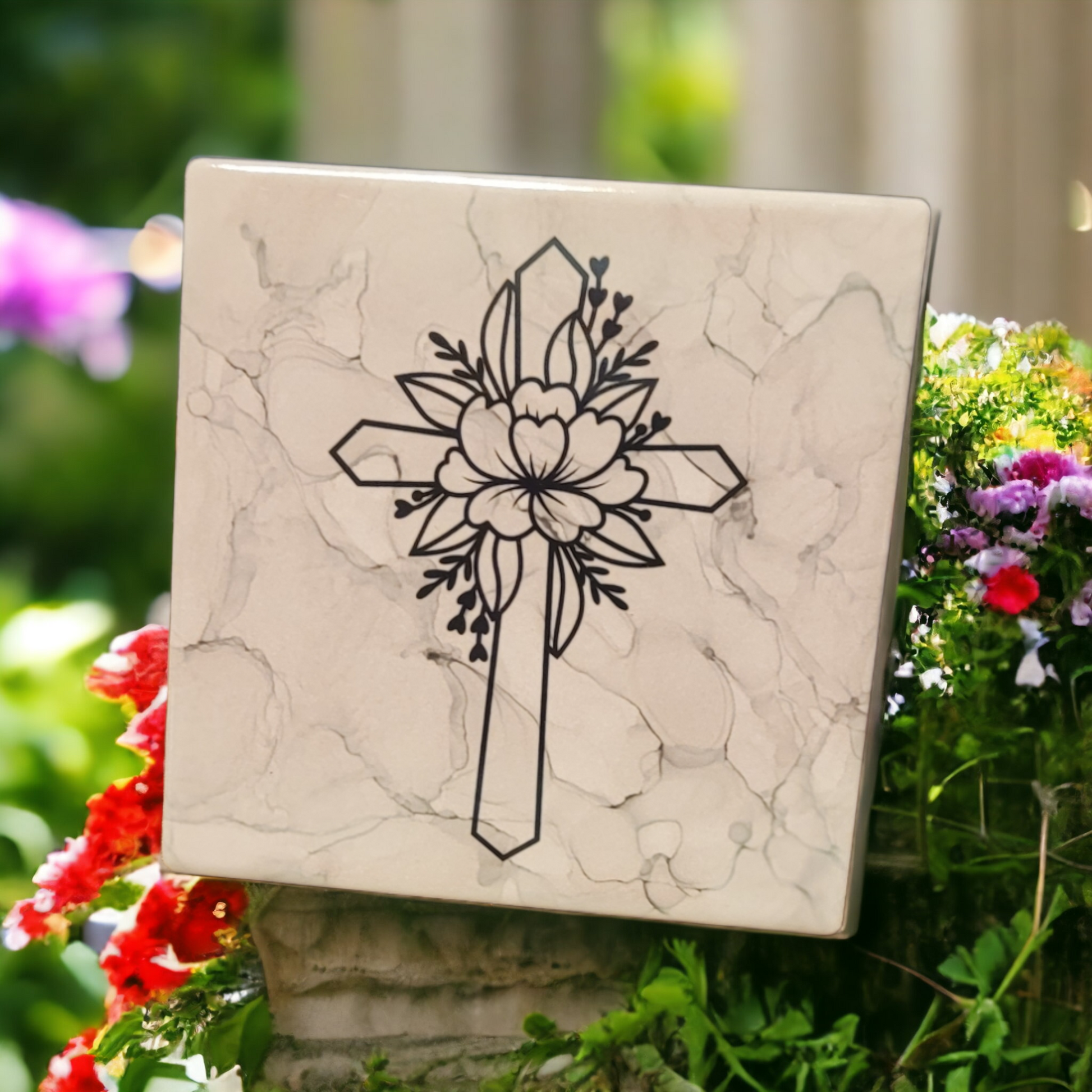 A 4.5 x 4.5-inch ceramic tile with a gray alcohol ink background and a cross with a flower on it.