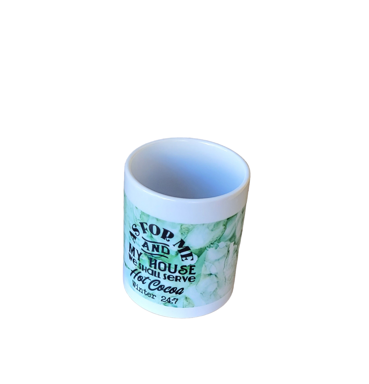 11 oz.  white mug with a partial green background and the words "As for Me and My House we shall serve Hot Coca Winter 24:7"