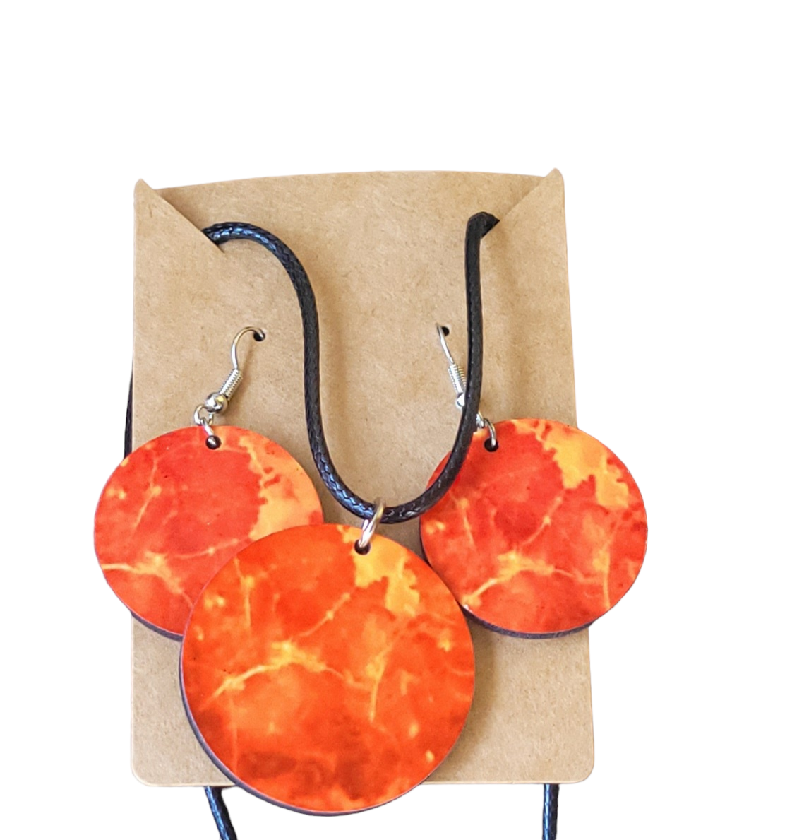 Orange circle shaped necklace set that includes a necklace and earrings