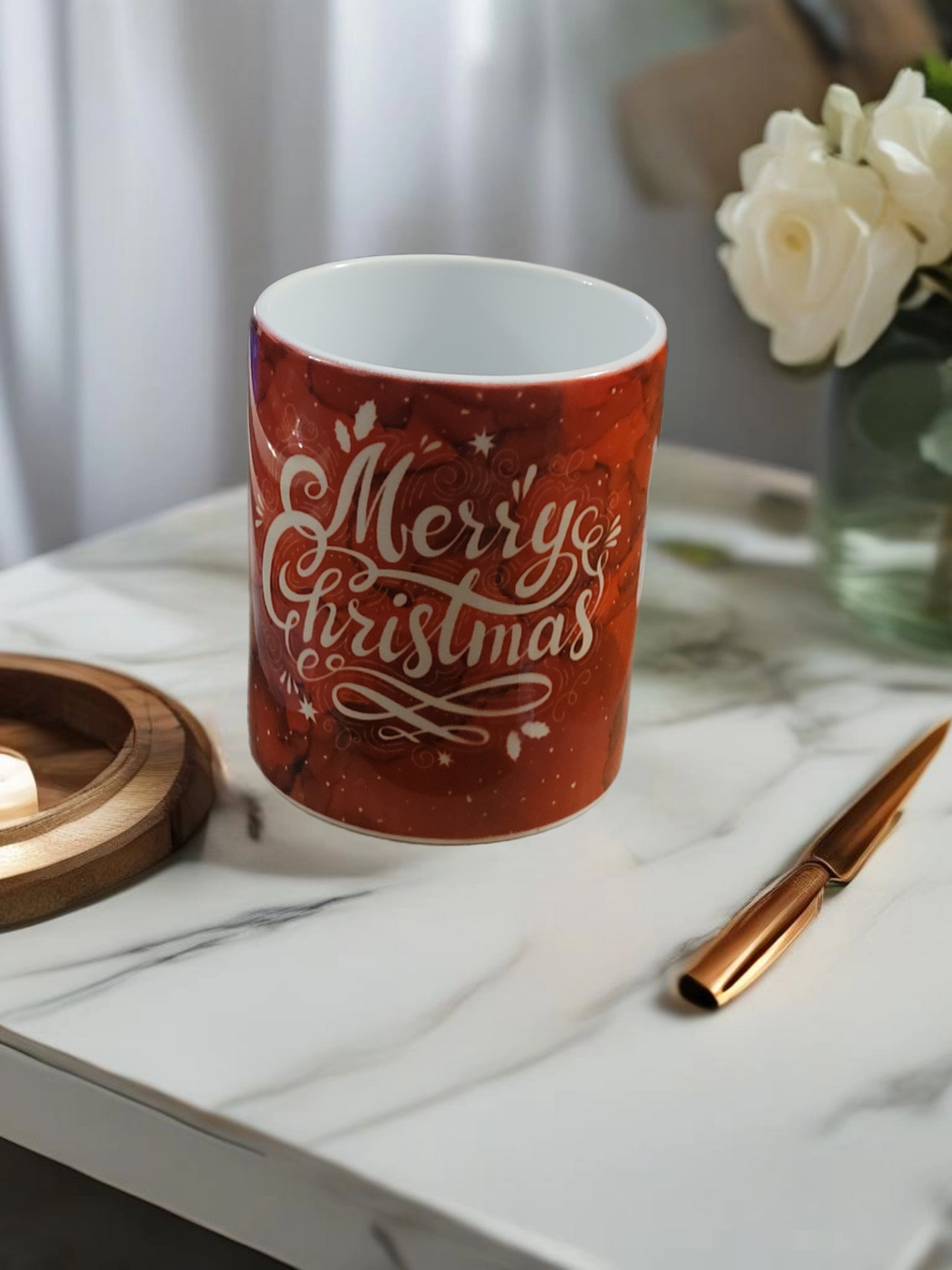 Red mug with the words Merry Christmas written in white